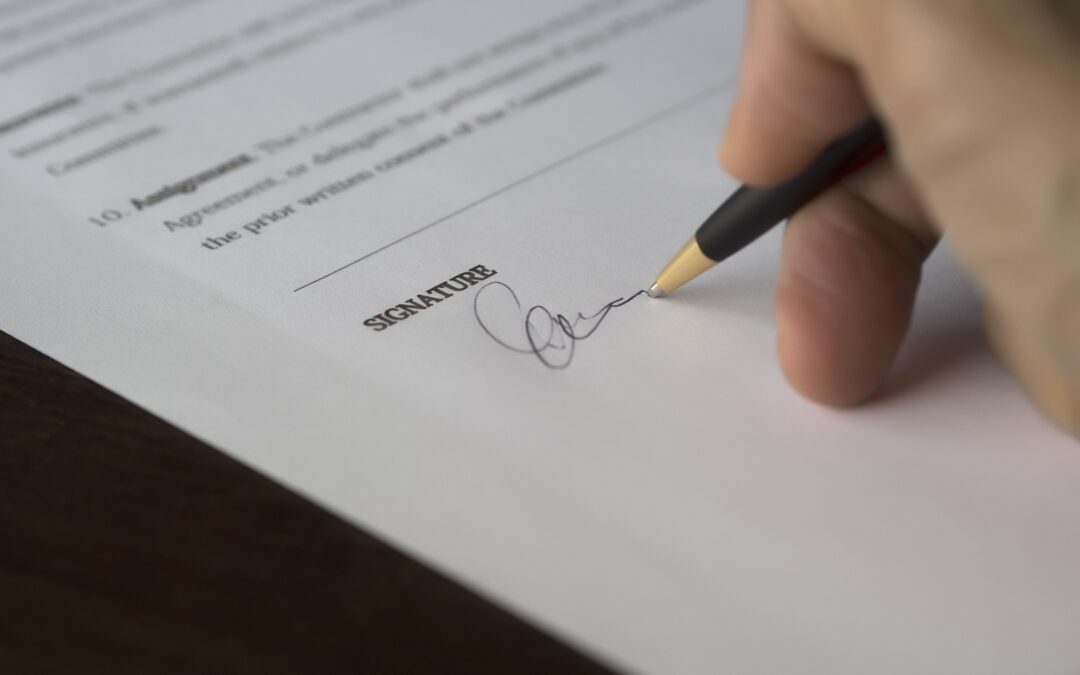What is a work contract and what are the mandatory elements?